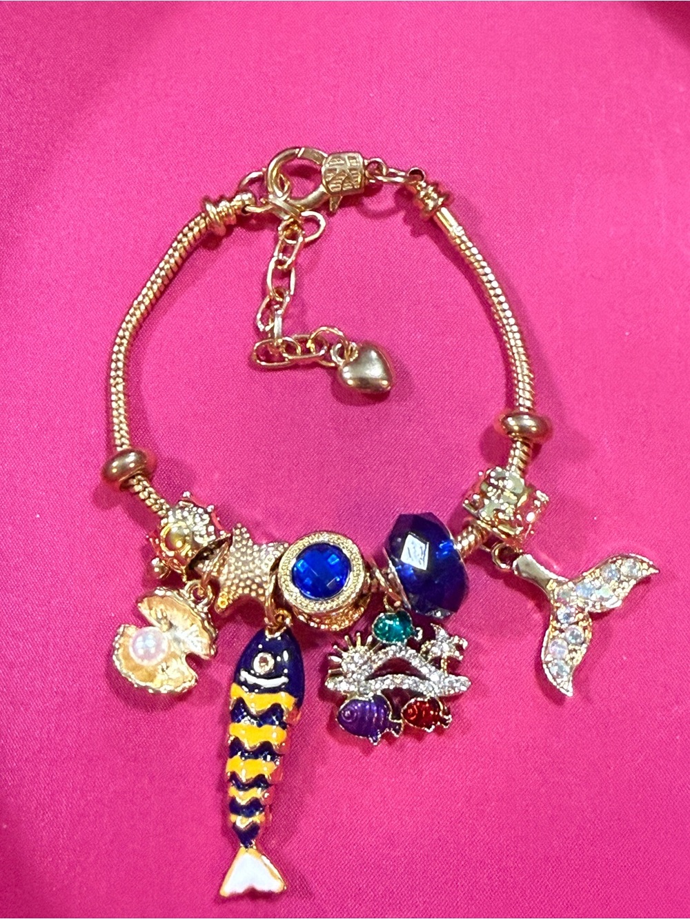 Gold-Tone Sea Life Charm Bracelet with Blue Accents